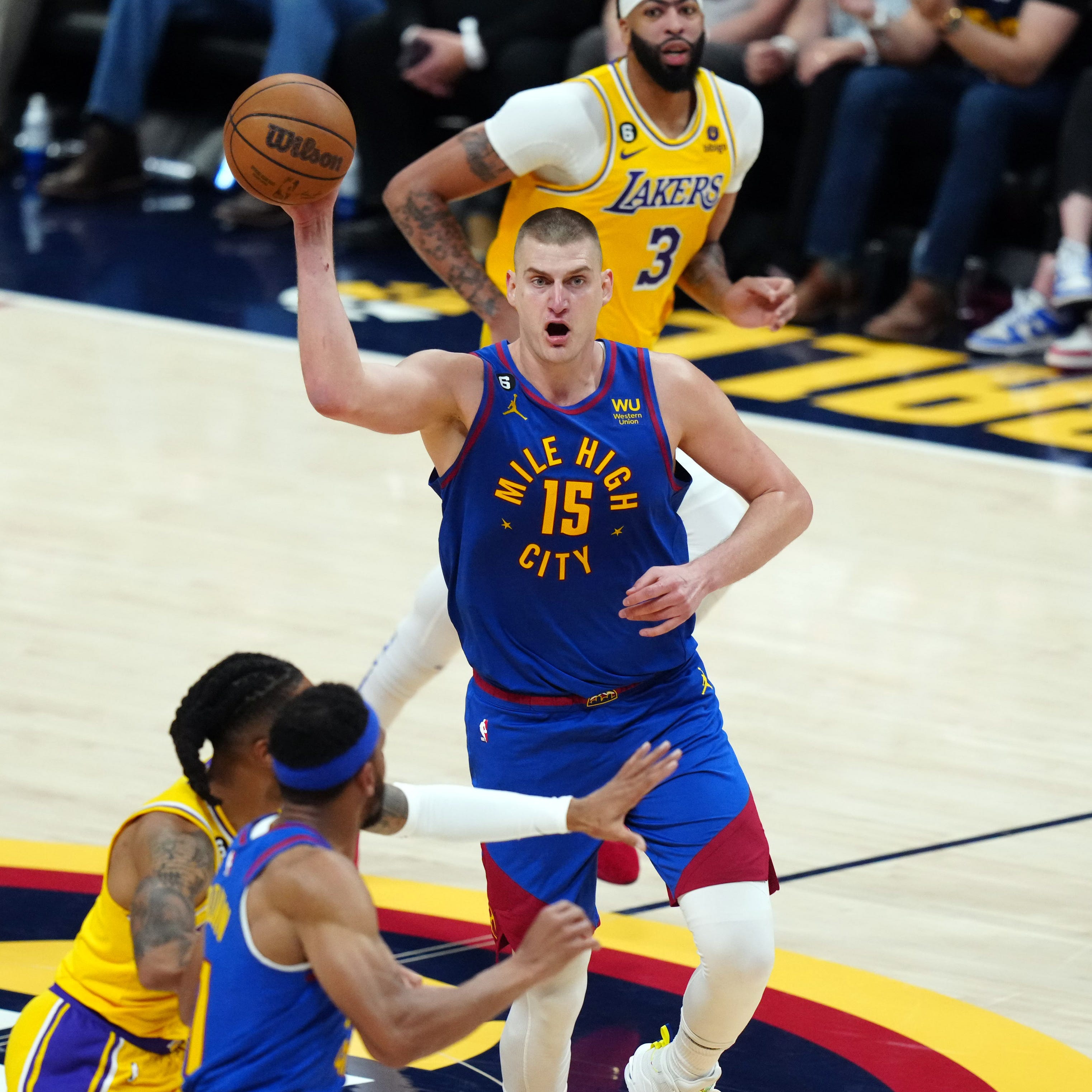 Denver Nuggets center Nikola Jokic passes in the second quarter of Game 1 against the Los Angeles Lakers.