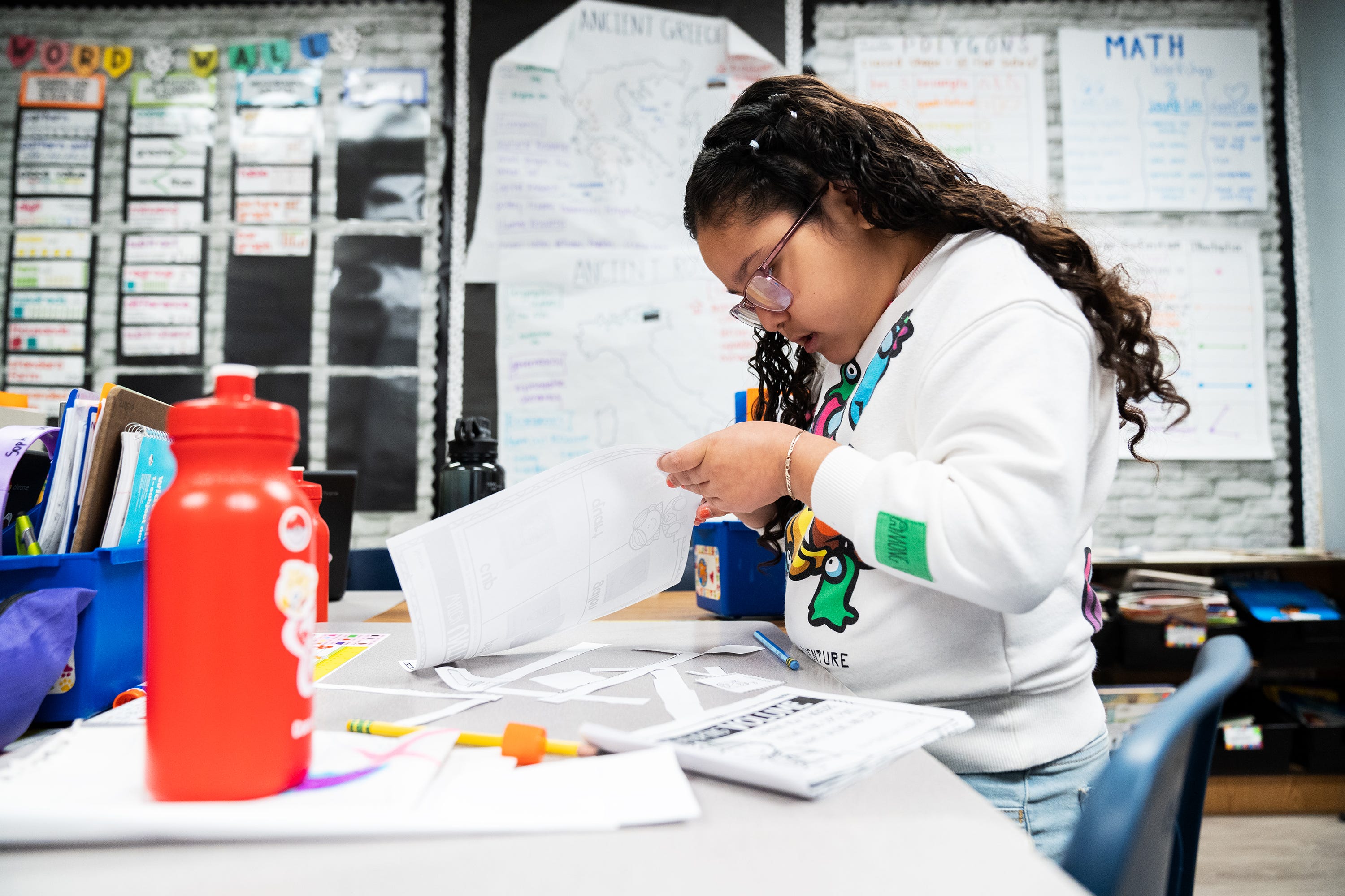 April 25, 2023; Alexandria, VA, USA; Ashley Soto, a third grader at Cora Kelly School, works on an assignment Tuesday, April 25, 2023.. Mandatory Credit: Josh Morgan-USA TODAY [Via MerlinFTP Drop]