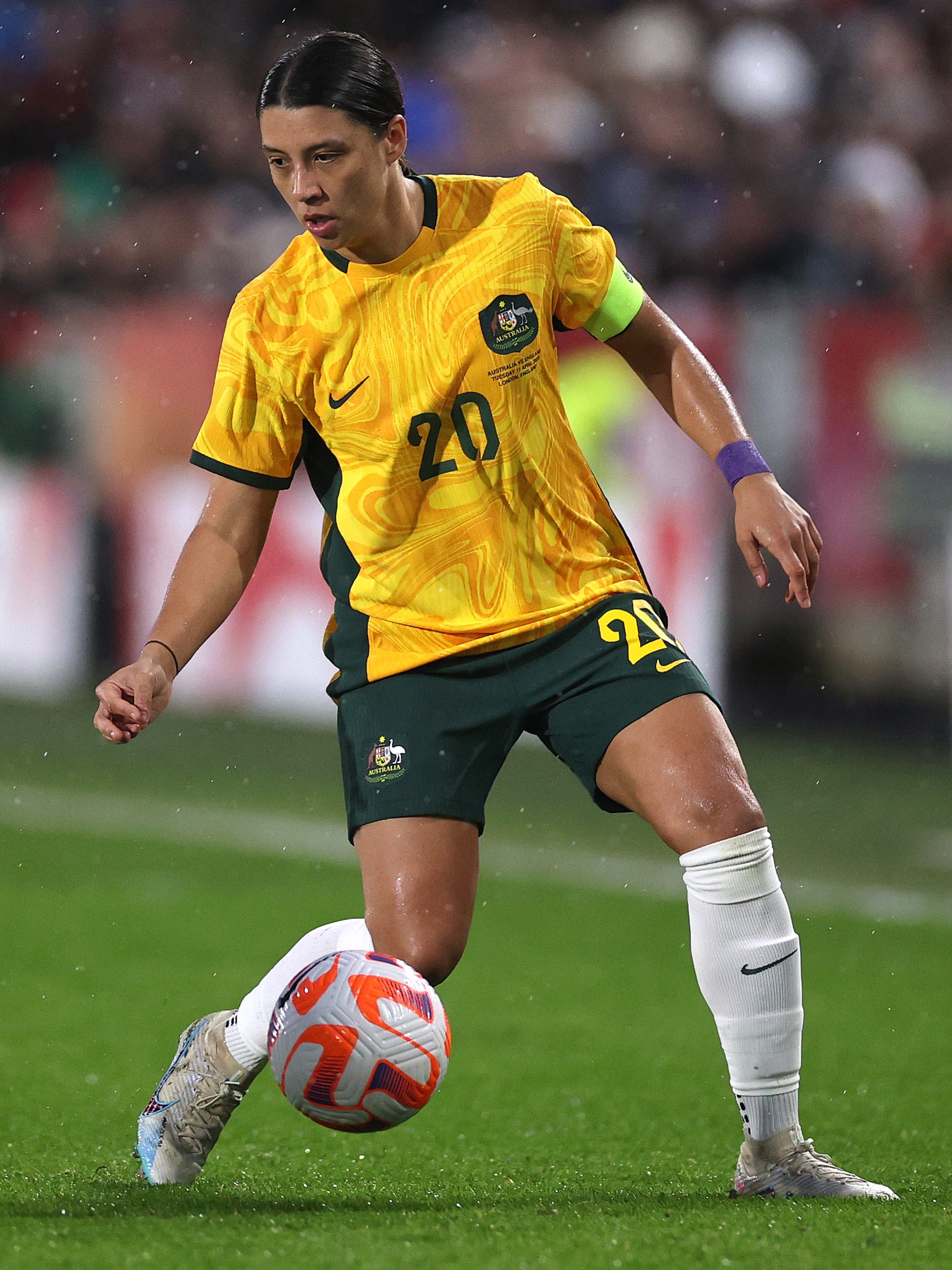 An action image of Sam Kerr playing soccer.