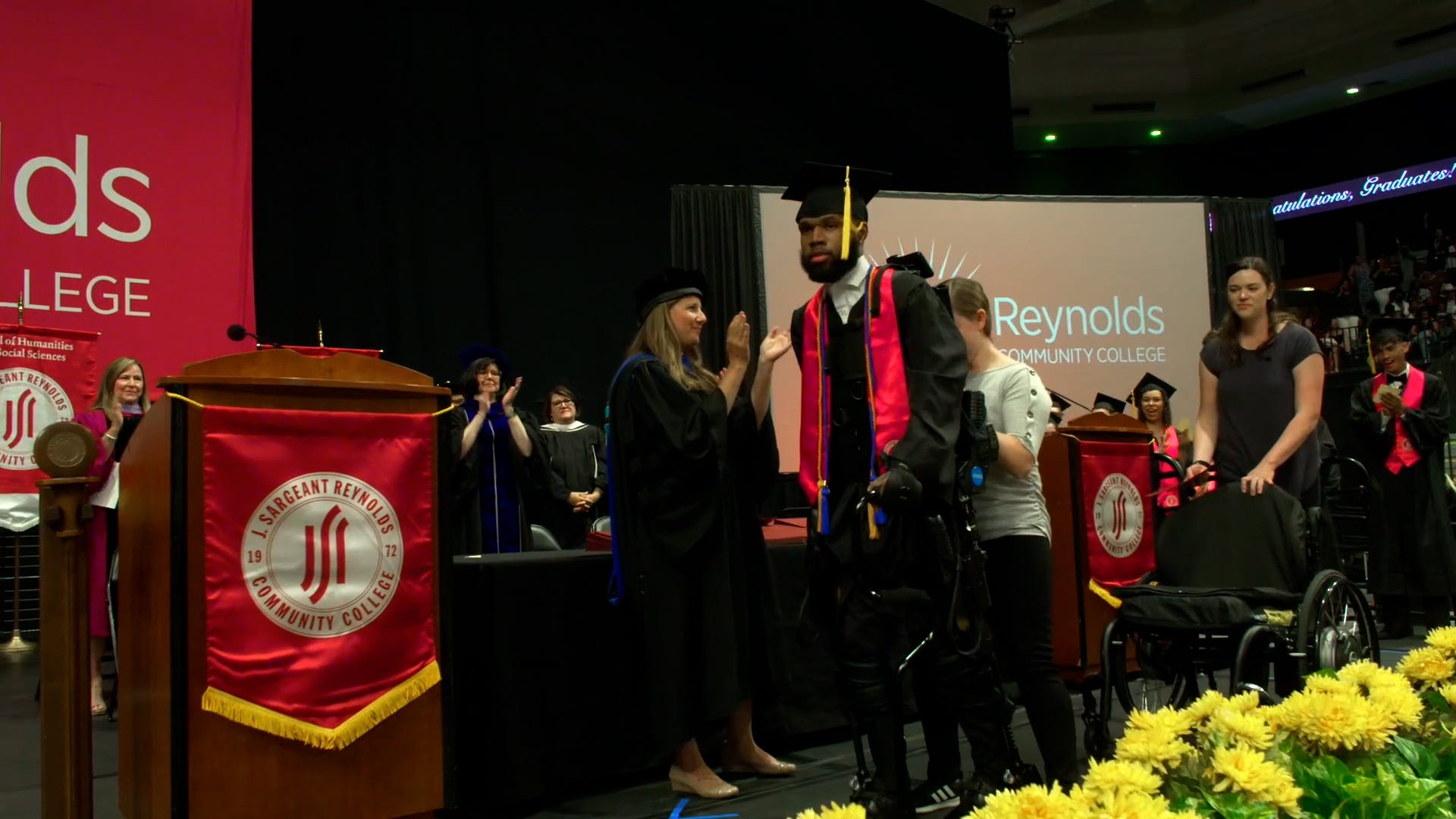 Student paralyzed in shooting uses robotic exoskeleton to receive diploma at graduation