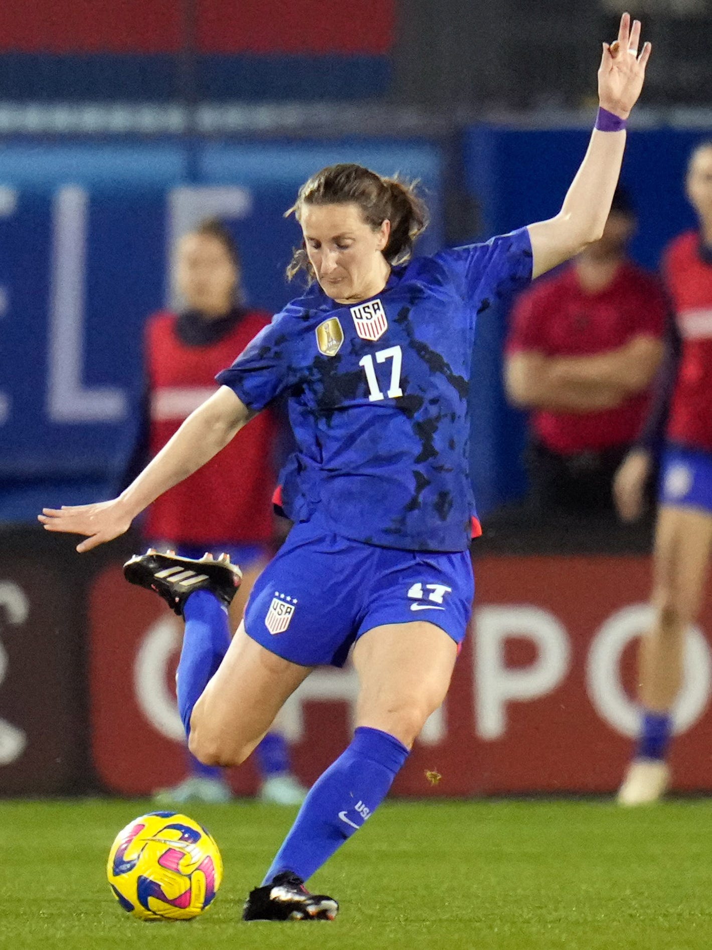 An action image of Andi Sullivan playing soccer.
