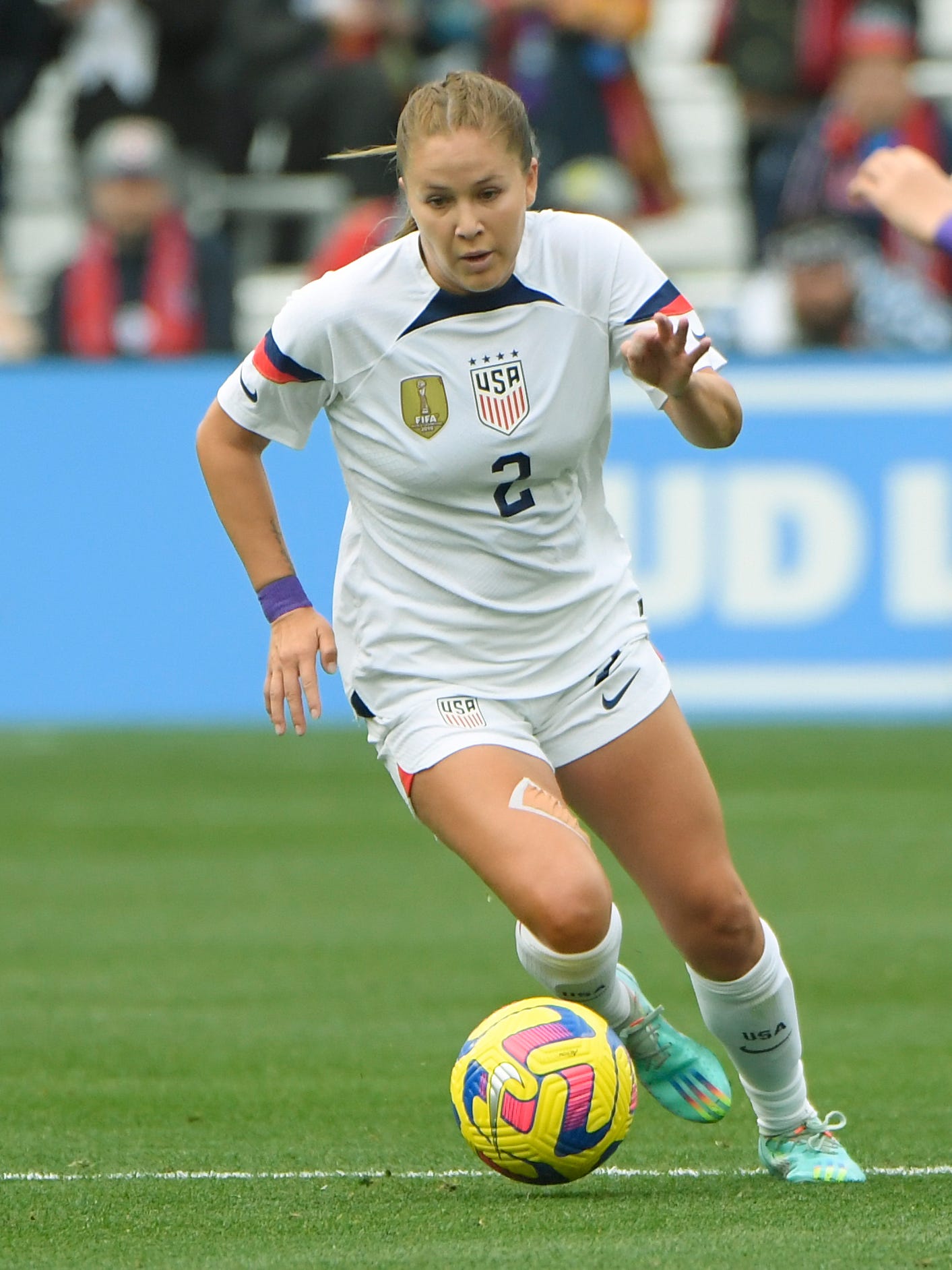 An action image of Ashley Sanchez playing soccer.