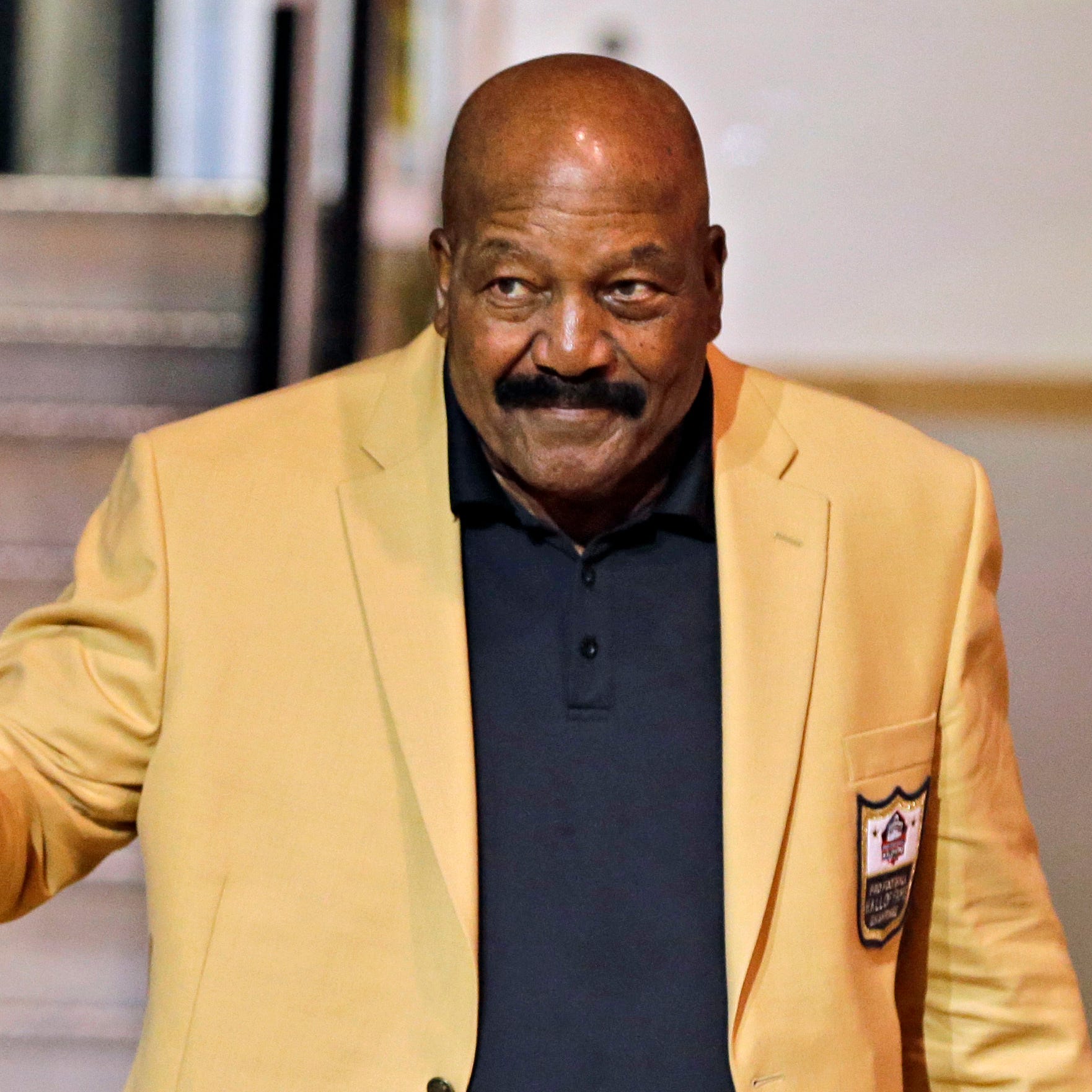 FILE - Jim Brown is introduced before the inaugural Pro Football Hall of Fame Fan Fest Friday, May 2, 2014, at the International Exposition Center in Cleveland. NFL legend, actor and social activist Jim Brown passed away peacefully in his Los Angeles home on Thursday night, May 18, 2023, with his wife, Monique, by his side, according to a spokeswoman for Brown's family. He was 87. (AP Photo/Mark Duncan, File) ORG XMIT: NYDD210