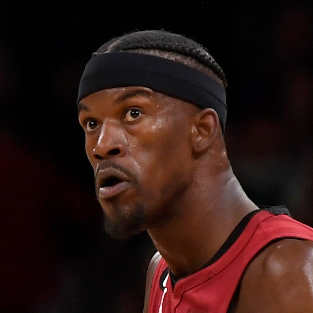 Miami Heat forward Jimmy Butler (22) looks to pass in front of Boston Celtics guard Malcolm Brogdon (13) during Game 1 of the Eastern Conference Finals.