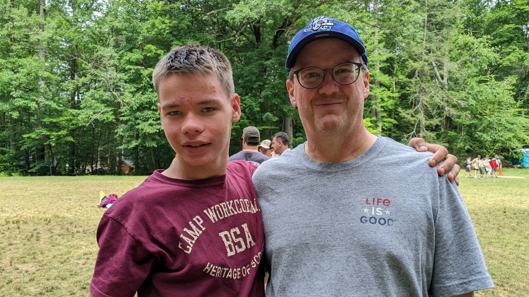 Chris Kelly with his son, Thomas, at Boy Scout Camp in the summer of 2022. Kelly worries a government default could halt the disability payments his son receives.