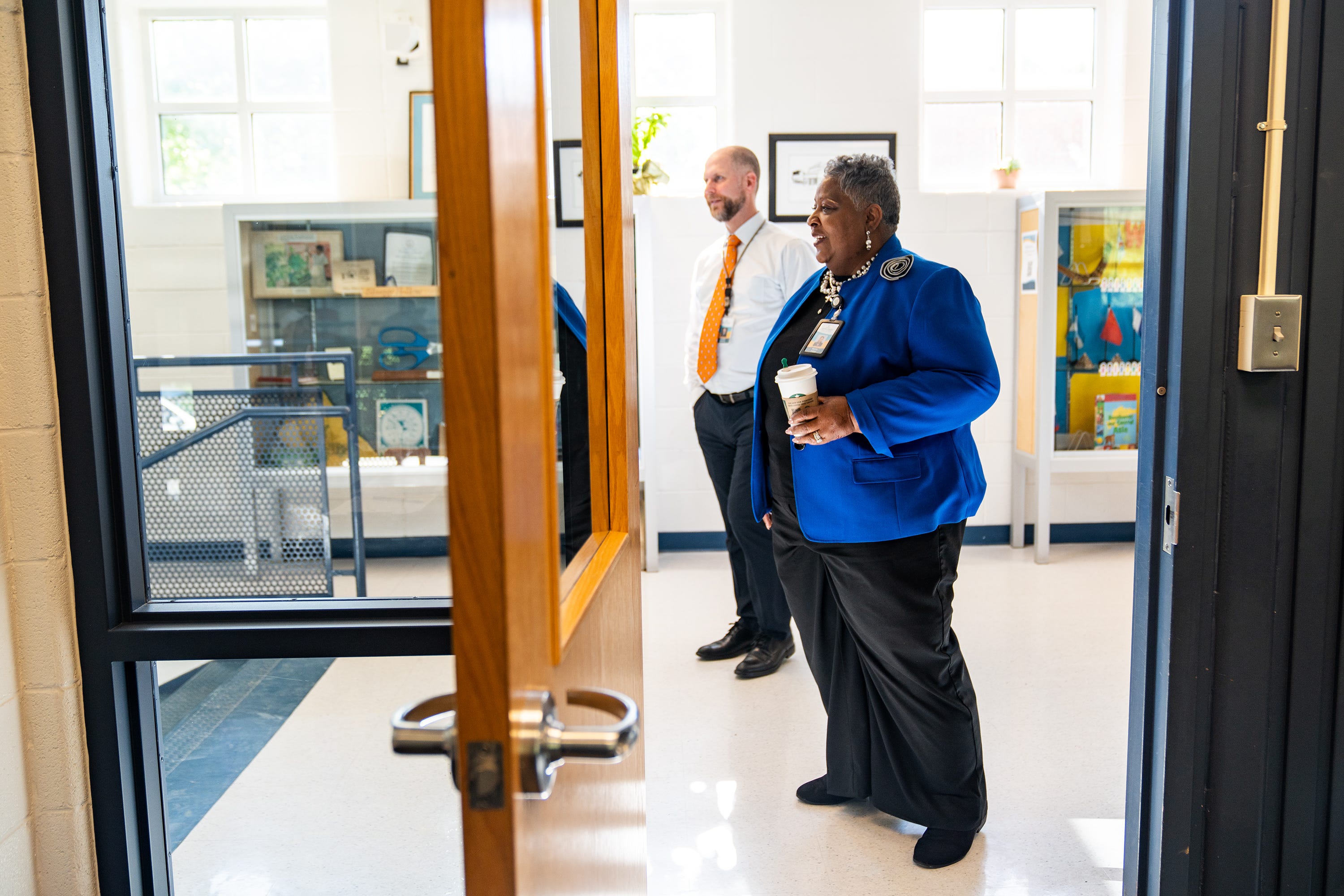 Sleepy Hollow Elementary School Principal Mattie Fallen and Assistant Principal Timothy Scesney stand in the hallway.