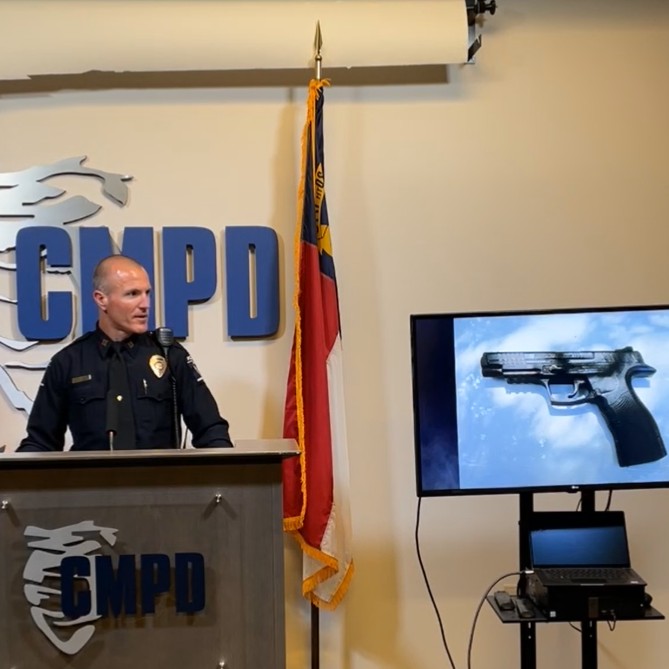 Charlotte-Mecklenburg Police Department Captain Jason Helton addresses reporters about an armed robbery involving two brothers, ages 6 and 12, in which one of the children pointed what was later determined to be a BB gun at a woman's face after stealing her cell phone on May 22, 2023.