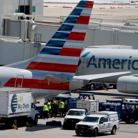MIAMI, FLORIDA - MAY 02: American Airline planes are parked at their Miami International Airport terminal gates on May 02, 2023 in Miami, Florida. American Airlines pilots voted overwhelmingly to authorize a strike if the union's negotiations with American Airlines' management, which are currently ongoing, are unable to come to a satisfactory outcome. (Photo by Joe Raedle/Getty Images) ORG XMIT: 775973340 ORIG FILE ID: 1487118147