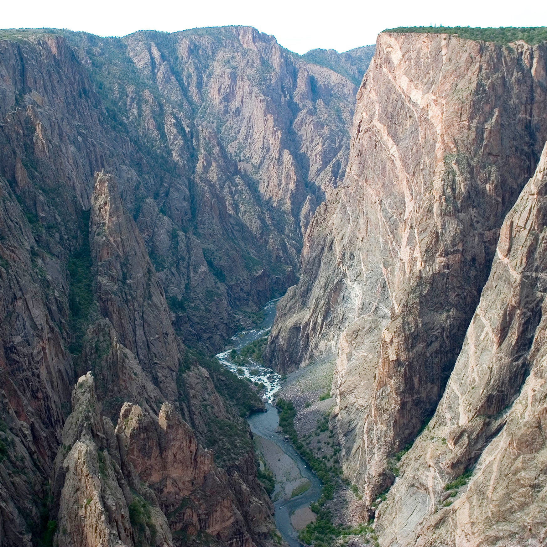 Painted Wall is seen on the right looking downstream from Chasm View at Black Canyon of the Gunnison National Park.