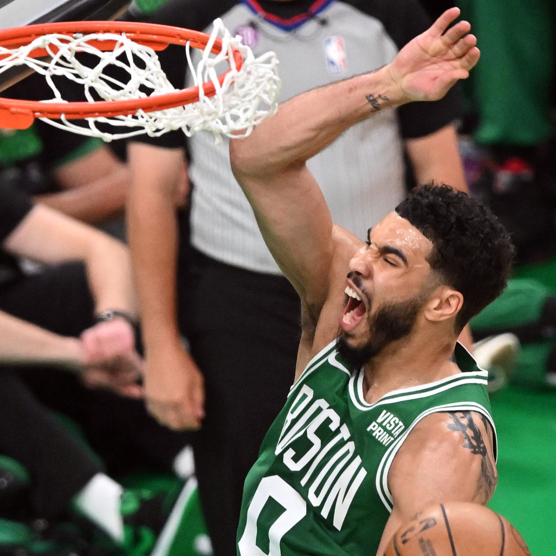 Jayson Tatum reacts after a shot against Miami in the first quarter during Game 5 of the Eastern Conference finals.