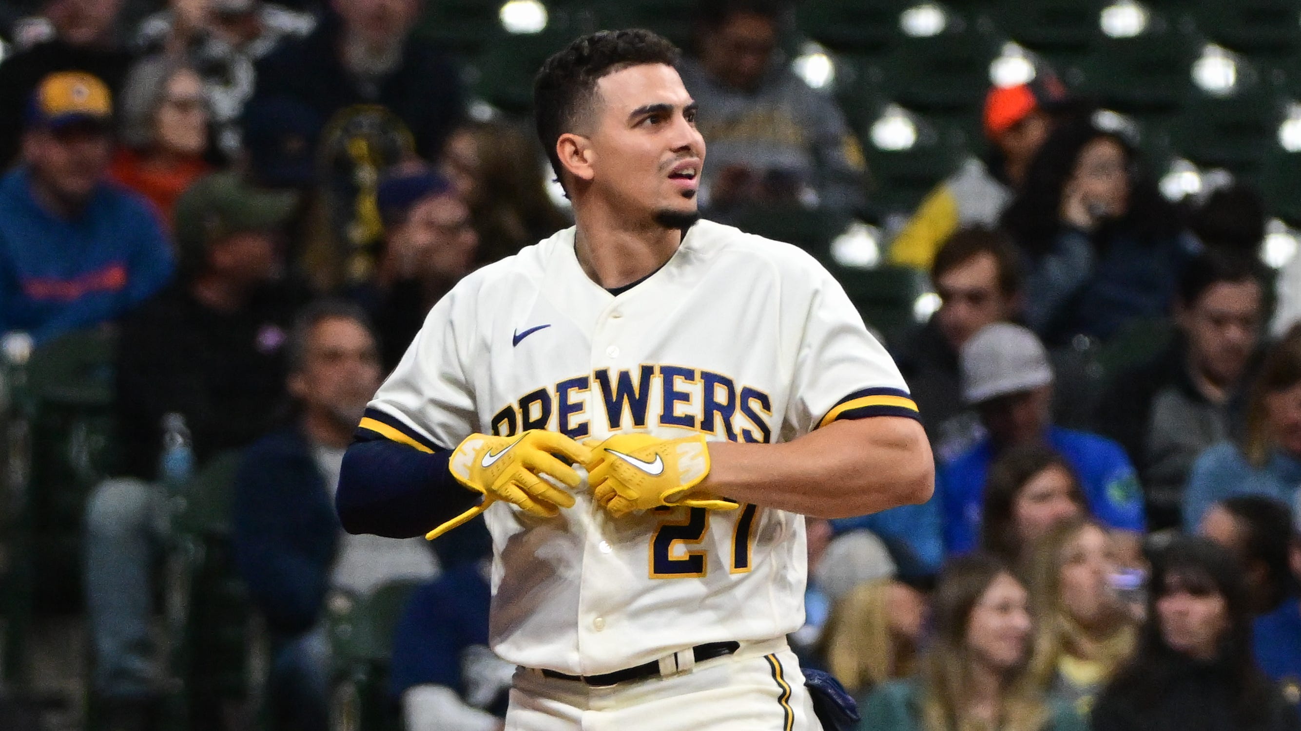 Brewers shortstop Willy Adames had to leave Friday night's game against the Giants after he was struck by a foul ball while in the dugout.