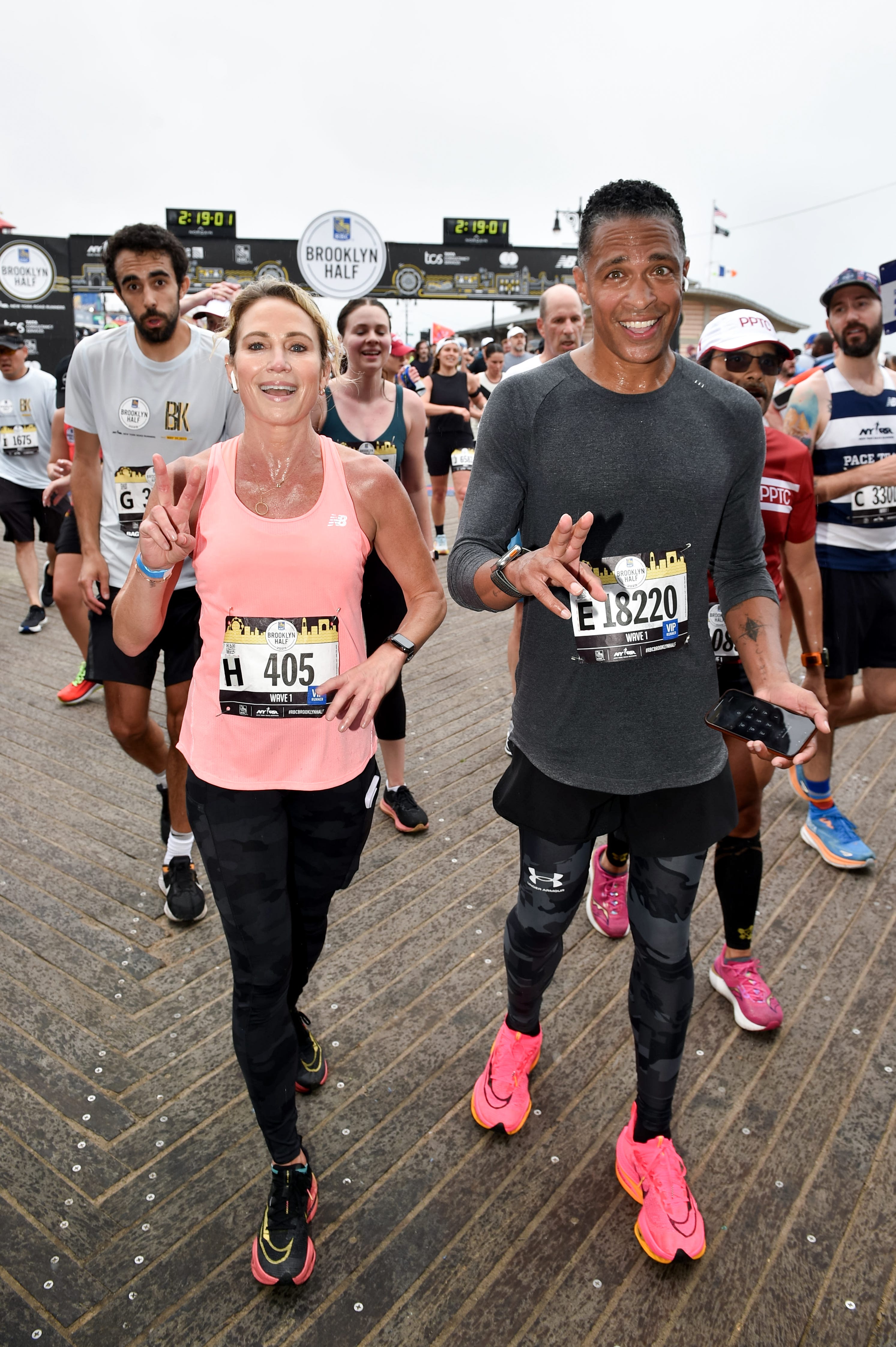 Amy Robach and T.J. Holmes finish the Brooklyn Half Marathon together on May 20.