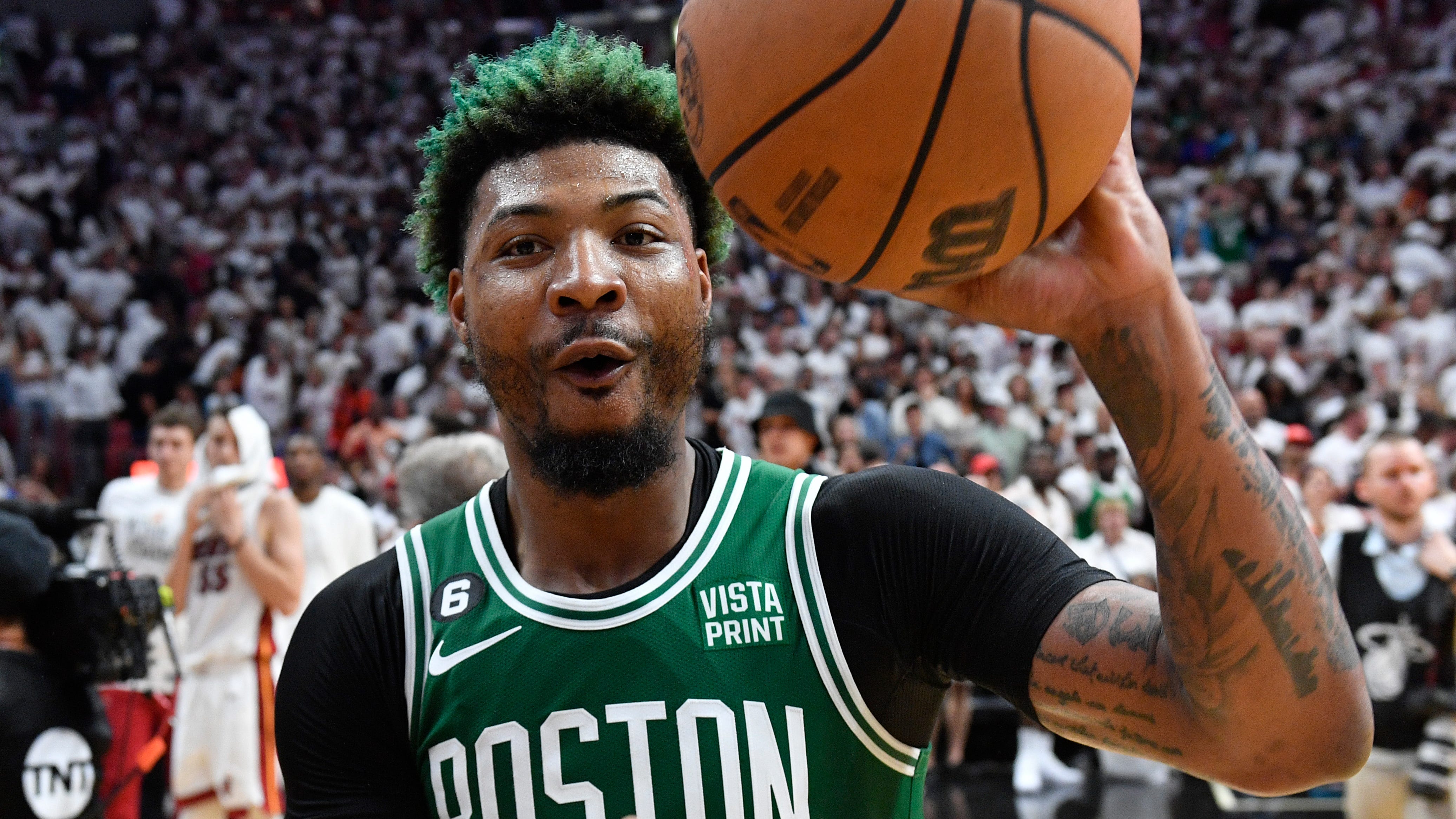 Marcus Smart celebrates after the Boston Celtics defeated the Miami Heat in Game 6 of the Eastern Conference Finals.