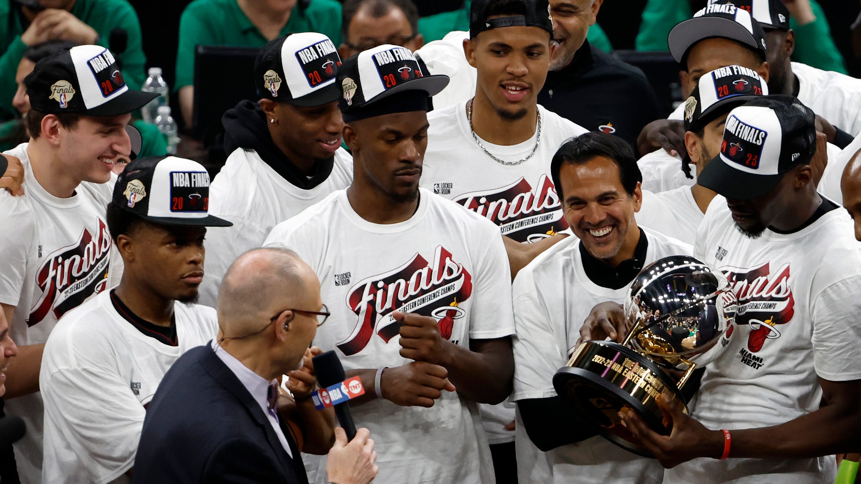 Heat coach Erik Spoelstra celebrates with the team after Miami's Game 7 win over the Celtics.
