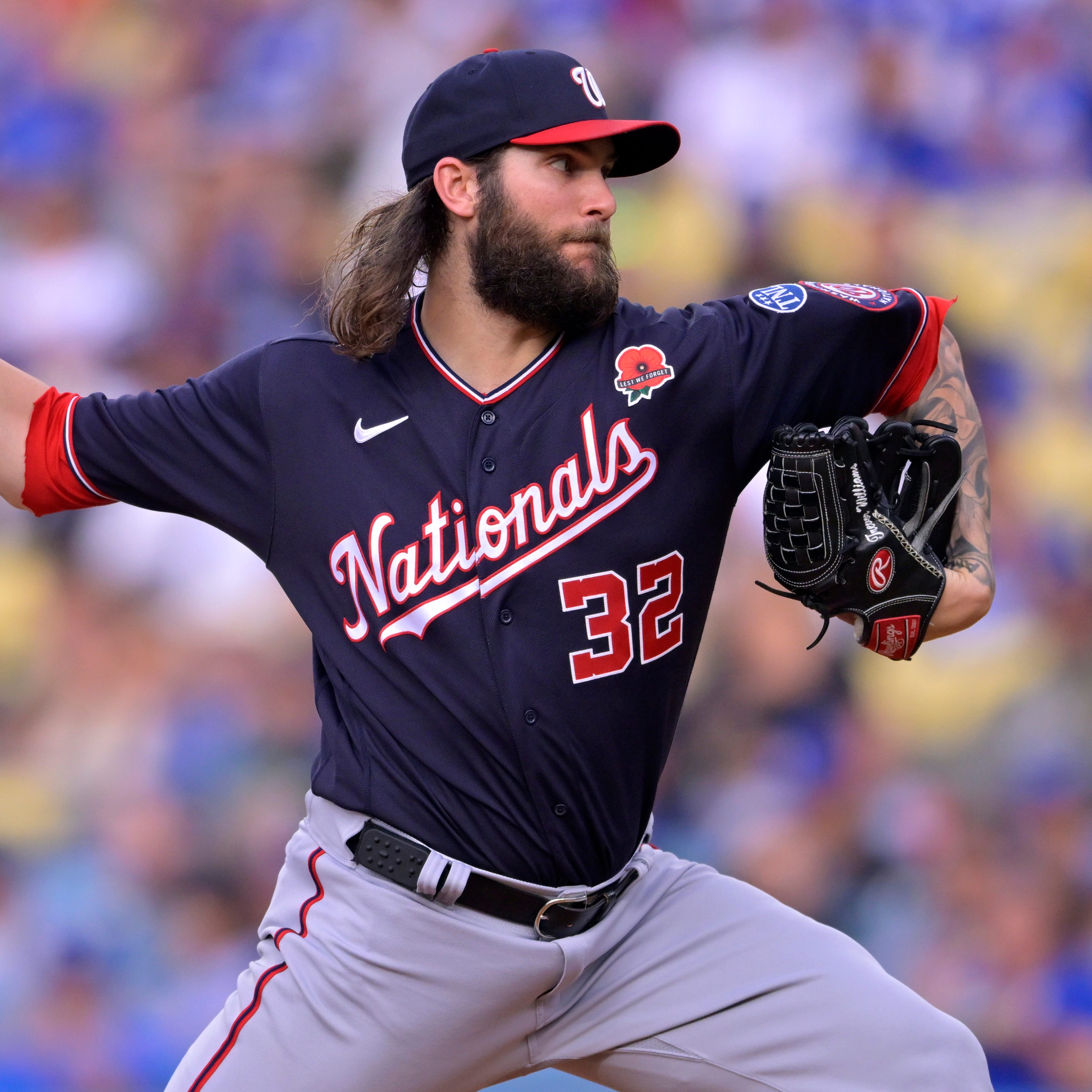 Washington Nationals starting pitcher Trevor Williams (32) throws to the plate in the first inning against the Los Angeles Dodgers at Dodger Stadium.