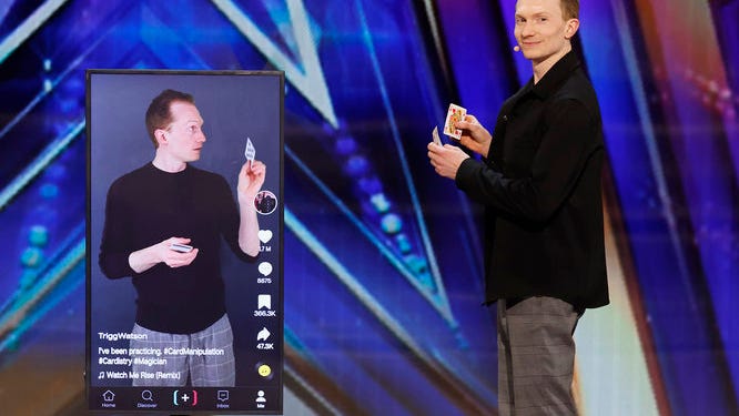 Magician Trigg Watson captivated the judges with a technological magic act, which saw the illusionist do several tricks with a large tablet.
