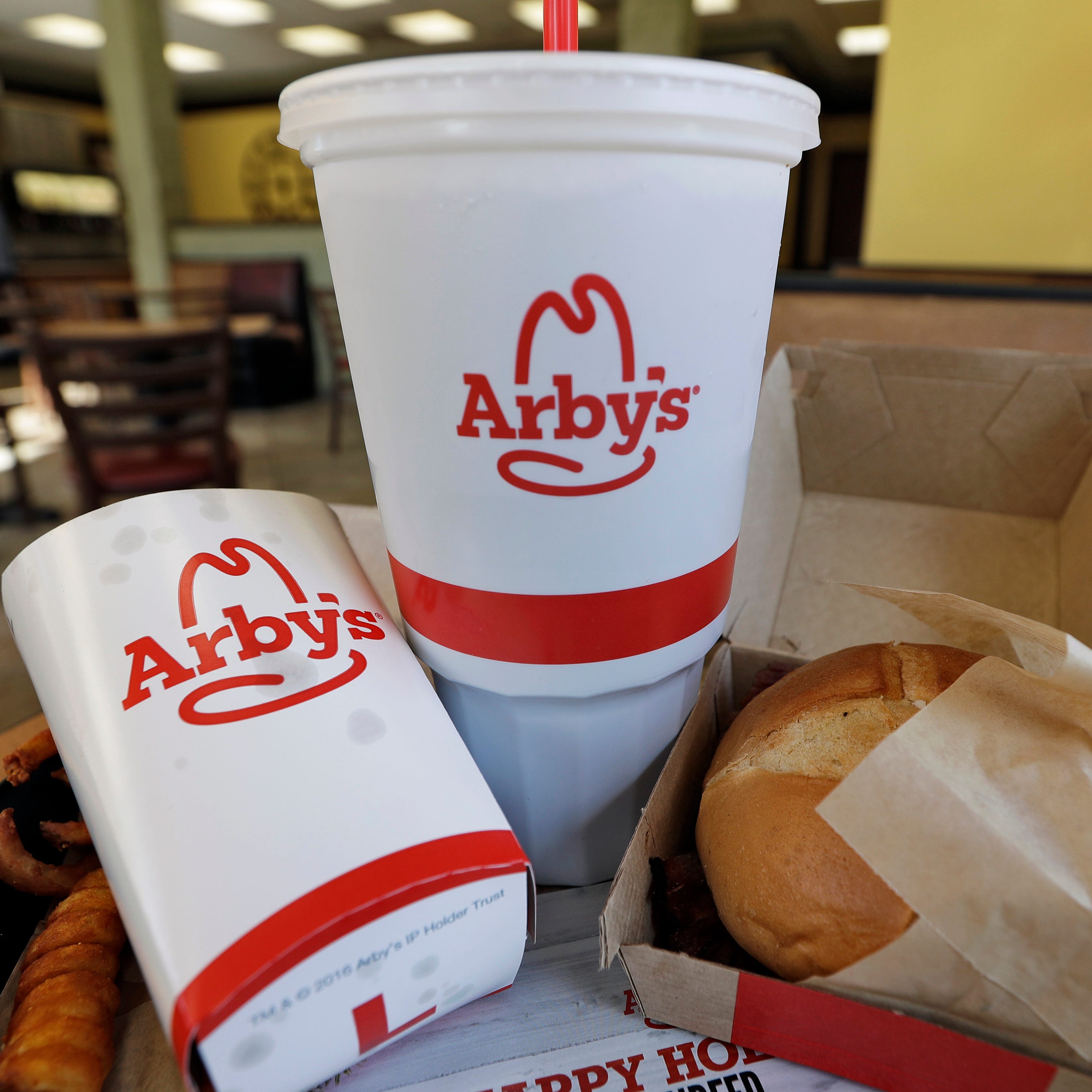 The Arby's fast-food chain and franchise owner are being sued by the children of Nguyet Le, 63, who died May 11. Her body, police said, was found in a locked Arby's walk-in freezer at a New Iberia, La., store.
