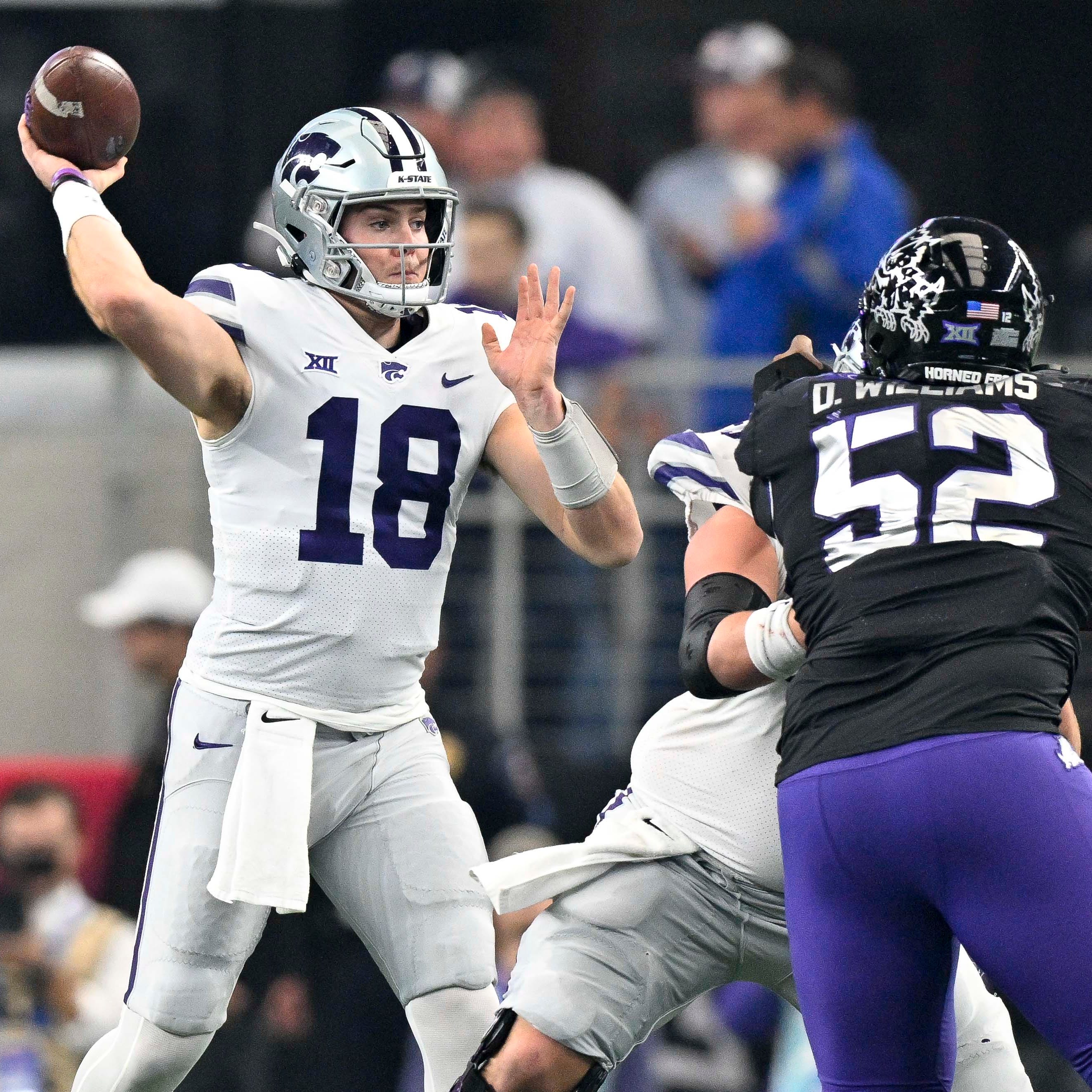 Kansas State quarterback Will Howard (18) prepares to throw a pass during the 2022 Big 12 championship game against TCU at AT&T Stadium.