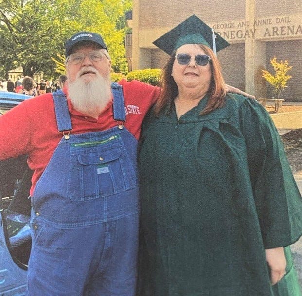 Cammy Lowe, who considers herself a face-to-face learner, celebrates graduating from college, which she completed entirely online, with her husband Dale Lowe.
