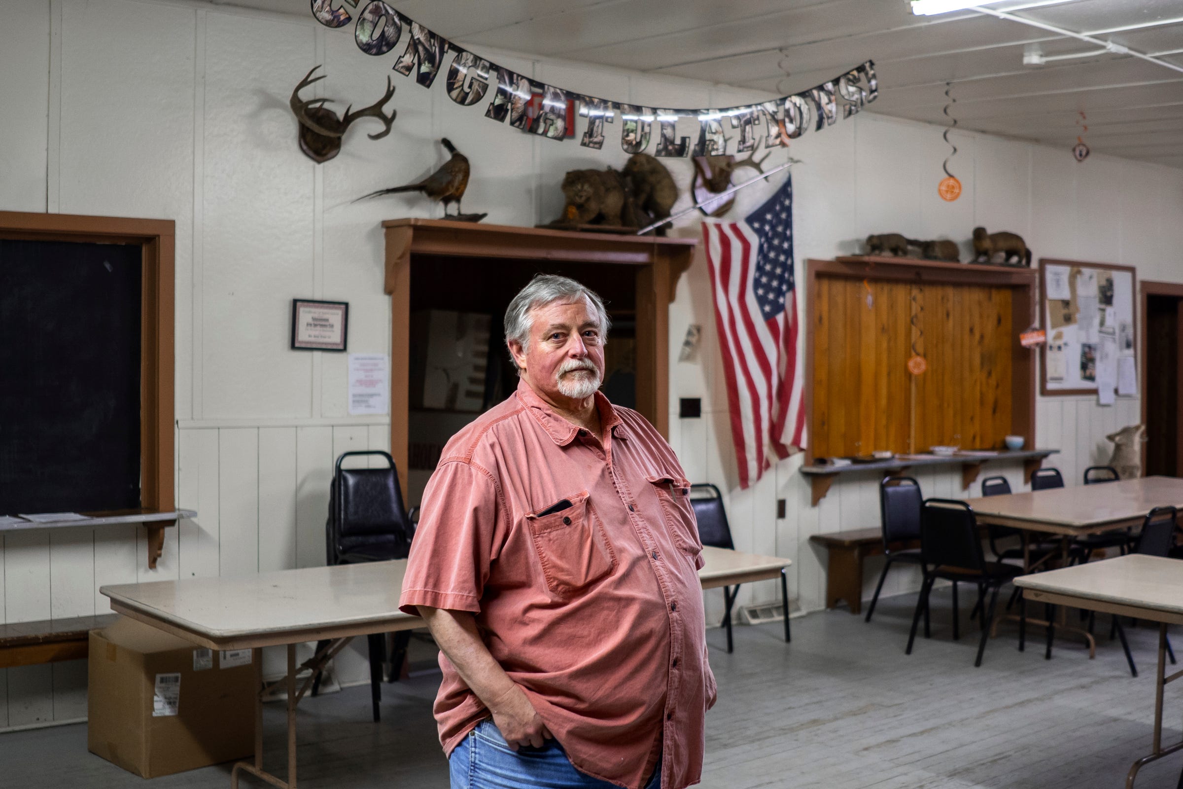 Terry Trepanier, 68, stands inside the Tahquamenon Sportsmen's Club in Newberry on Saturday, April 22, 2023, in Michigan's Upper Peninsula. He was named president of the club a few years ago during only his second meeting.