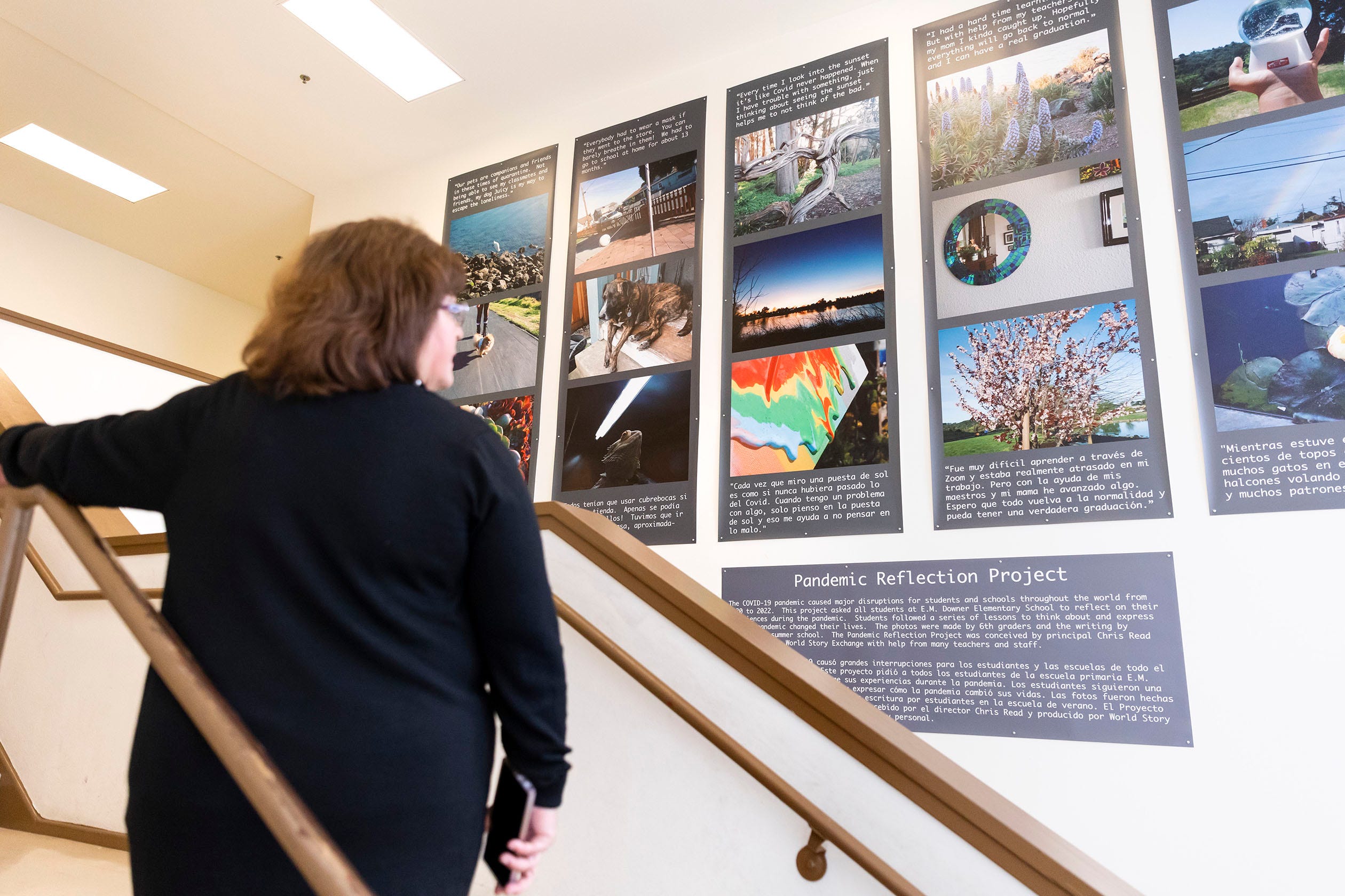 Vice Principal Ruby Gonzalez looks at the student photo project Pandemic Reflection Project that is displayed at Downer Elementary on Monday April 17, 2023; San Pablo, Calif.