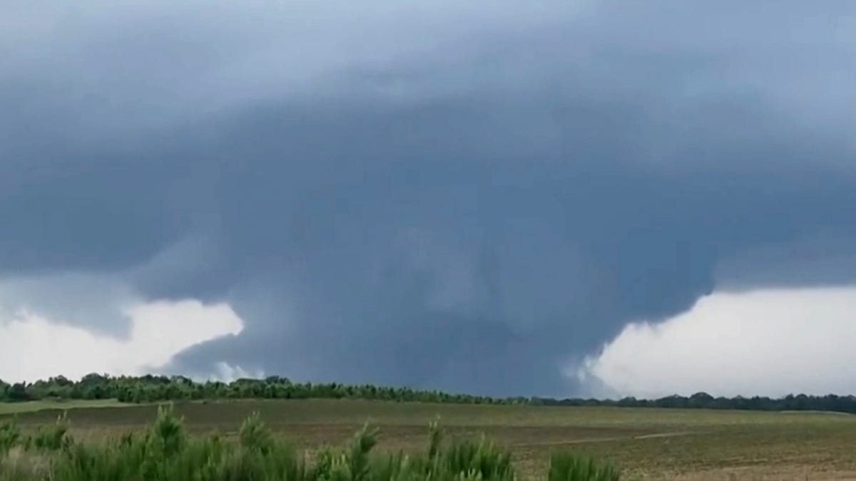 Punishing winds possible tornadoes inflict damage as storms cross US South Punishing winds possible tornadoes inflict damage as storms cross US South