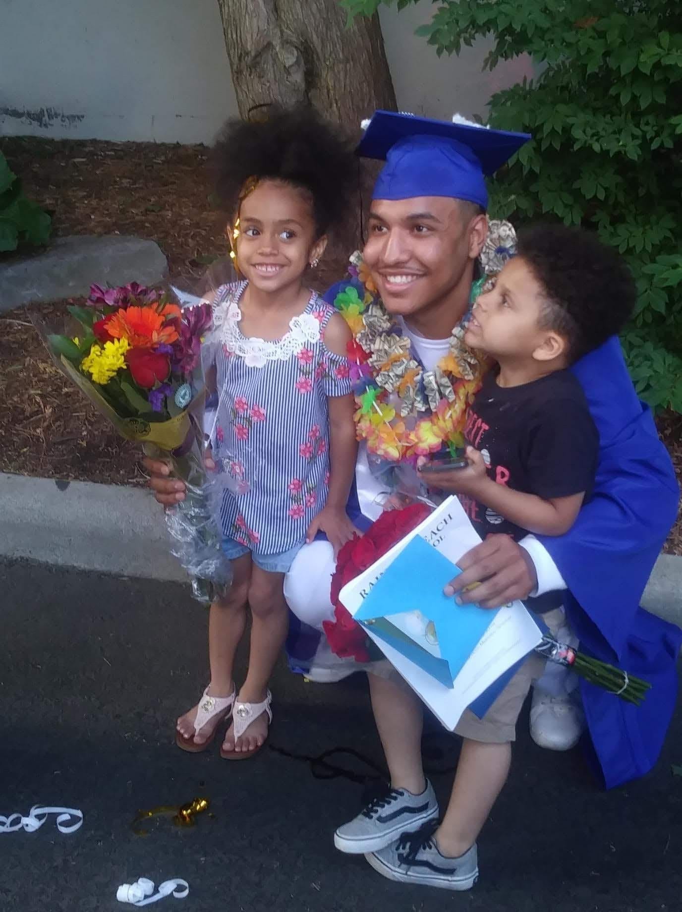 Elijah Lewis with the niece and nephew who became pillars of his world, and students of his activism.
