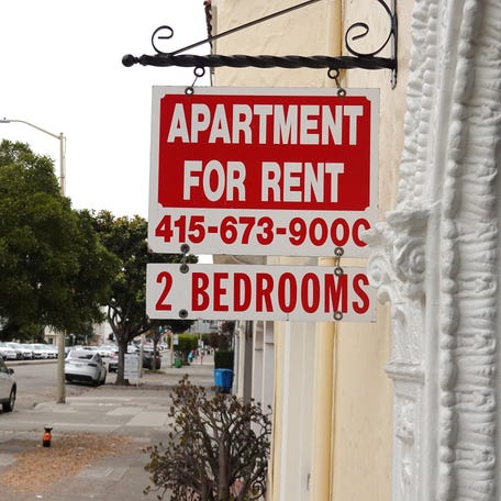 A sign is posted in front of an apartment building with available rentals on June 09, 2023 in San Francisco, California.