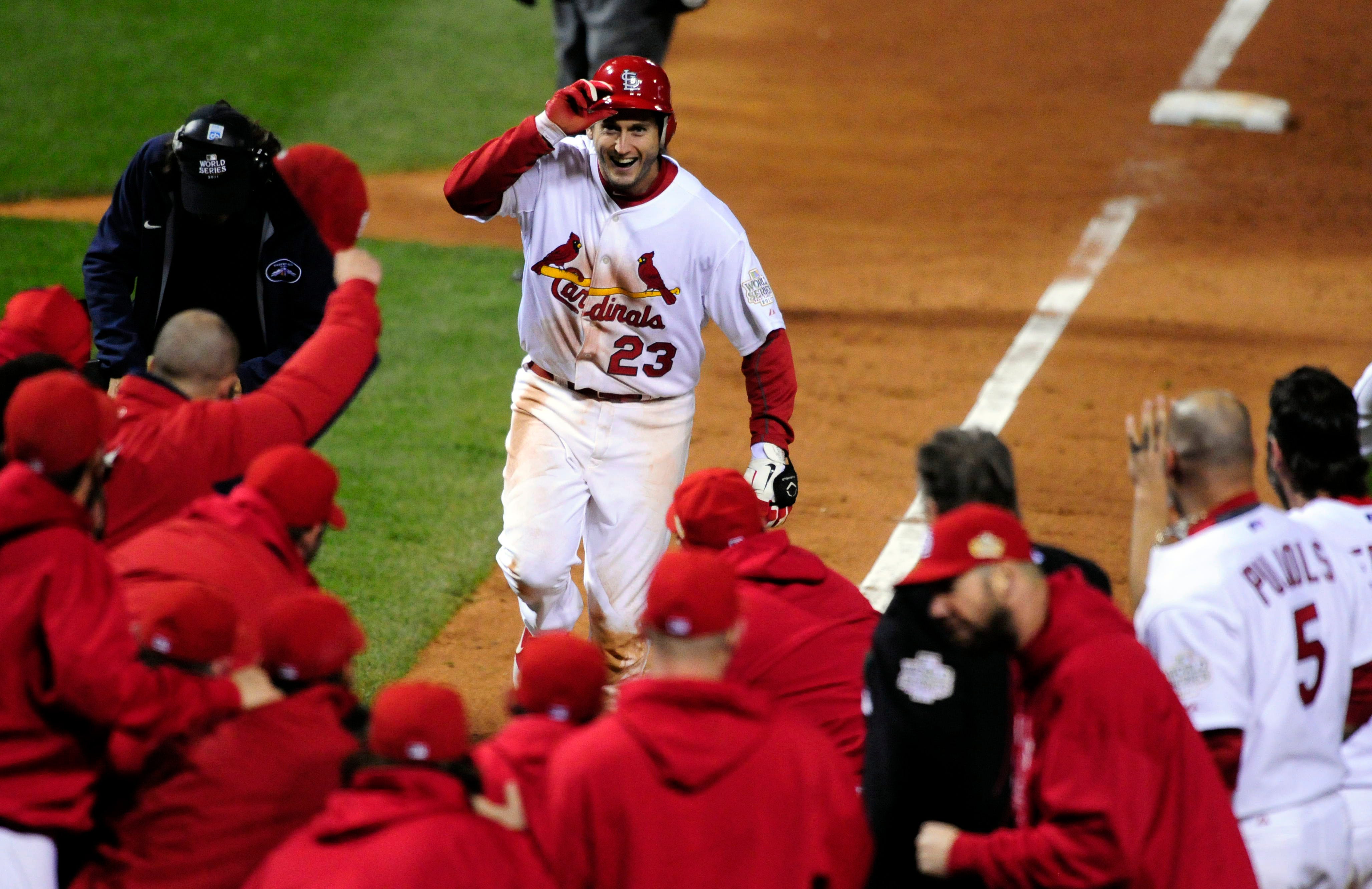 David Freese celebrates after hitting a walk-off home run in Game 6 of the 2011 World Series.