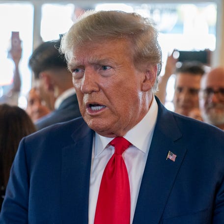 Former President Donald Trump speaks to the media as he visits Versailles restaurant on Tuesday, June 13, 2023, in Miami. Trump appeared in federal court Tuesday on dozens of felony charges accusing him of illegally hoarding classified documents and thwarting the Justice Department's efforts to get the records back.