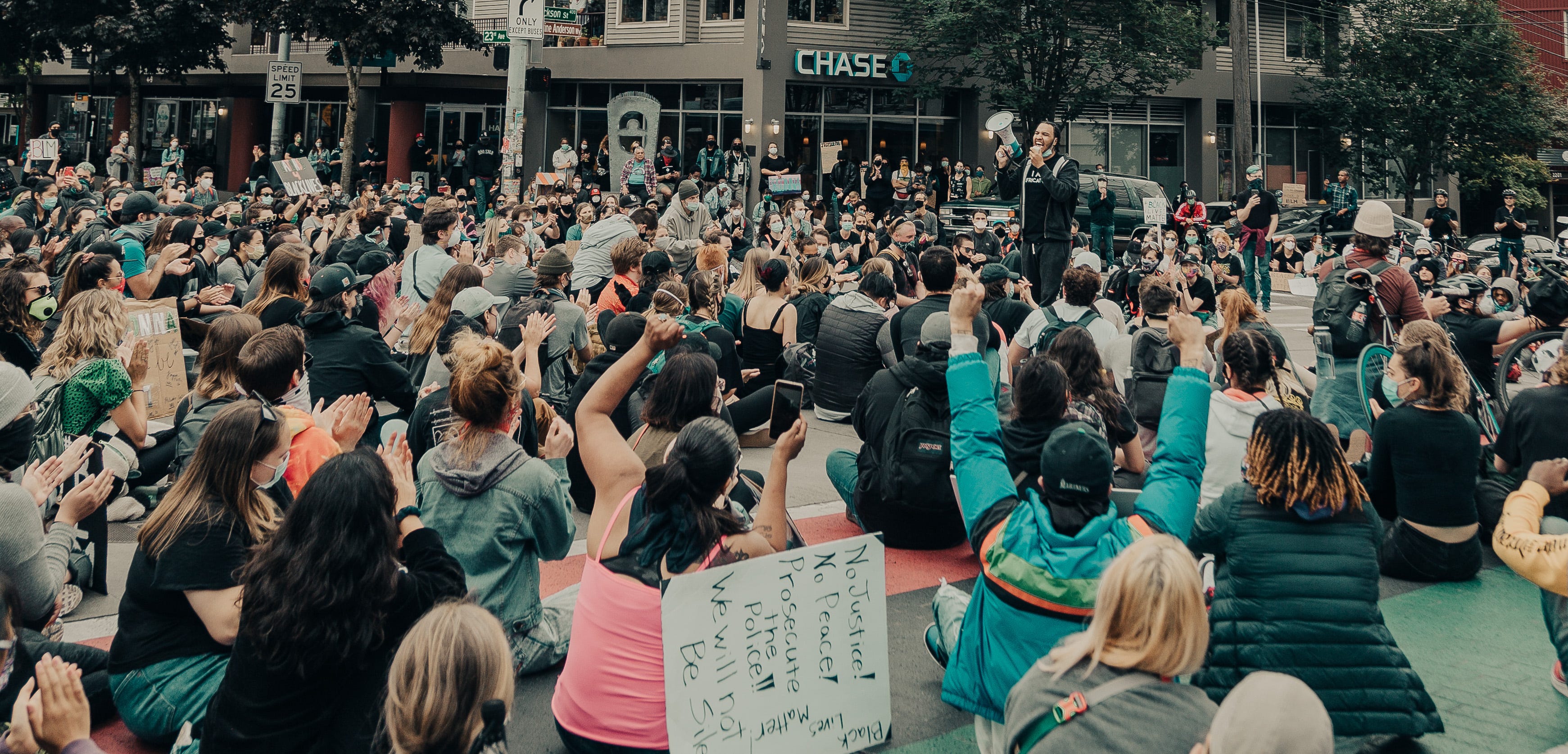 Elijah Lewis speaks to a crowd June 4, 2020, at a protest in response to the killing of George Floyd. By then, Lewis' activism had grown strong.