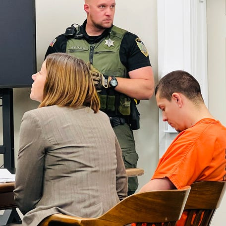 Majorjon Kaylor, 31, right, sits next to defense attorney Lisa Chesebro in a Wallace, Idaho, courtroom on Tuesday, June 20, 2023, during his first appearance on four murder charges. Prosecutors say Kaylor shot and killed his neighbors, including a child, Sunday evening. Idaho State Police have released few details, but said the shooting occurred after a "dispute between neighbors."