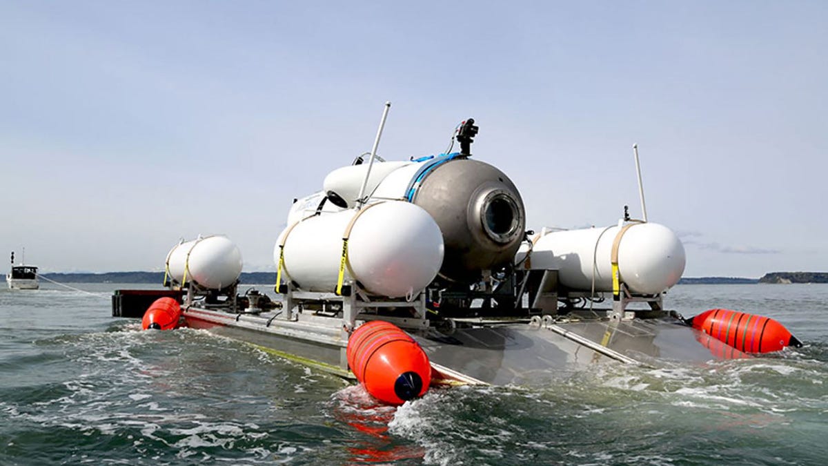 This image courtesy of OceanGate Expeditions, shows their Titan submersible being towed to a dive location.