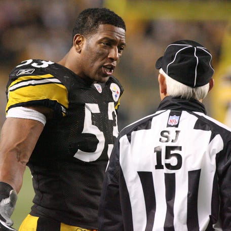 Nov 5, 2006; Pittsburgh , PA, USA; Pittsburgh Steelers linebacker Clark Haggans (53) argues a call with side judge Rick Patterson (15) in the second half at Heinz Field in Pittsburgh, PA. Denver won the game, 31-20.
