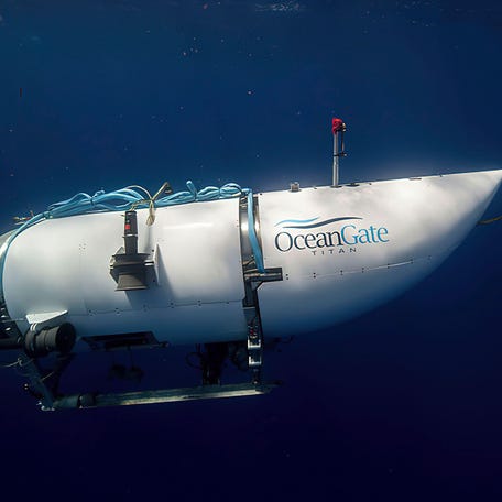 This photo provided by OceanGate Expeditions shows a submersible vessel named Titan used to visit the wreckage site of the Titanic. In a race against the clock on the high seas, an expanding international armada of ships and airplanes searched Tuesday, June 20, 2023, for the submersible that vanished in the North Atlantic while taking five people down to the wreck of the Titanic. (OceanGate Expeditions via AP) ORG XMIT: NYPS209