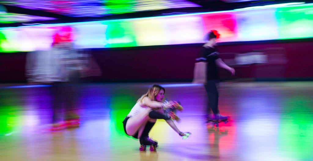 Roller skaters hit the rink at Moonlight Rollerway for Rainbow Skate Night on June 14, 2023. The Glendale, Calif., rink hosts the weekly LGBTQ+ event for all ages and skill levels.