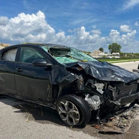 The vehicle recovered by the Fort Myers Police Department and Lee County Sheriff's Office is shown on Monday, June 26, 2023. Five bodies were found in the vehicle which was submerged in a retention pond near Top Golf.