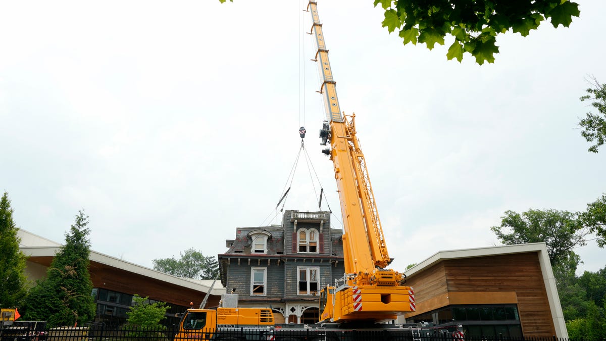 Englewood historic home lifted in air