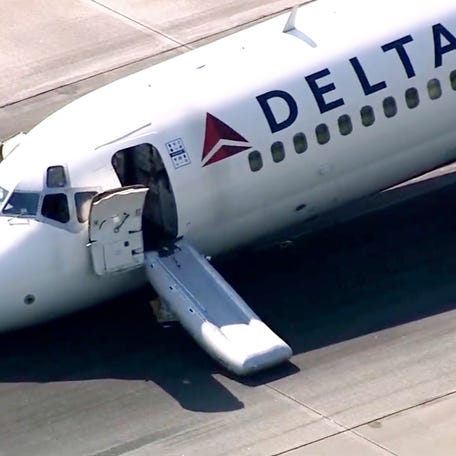 A Delta plane lands without its landing gear at the Charlotte Douglas International Airport, Wednesday, June 28, 2023 in Charlotte, N.C.   The airport said in a tweet that the runway was closed following a mechanical issue with Delta Air Lines. No injuries were reported and all passengers were taken to the terminal. The airport said it was working to remove the aircraft and reopen the runway.