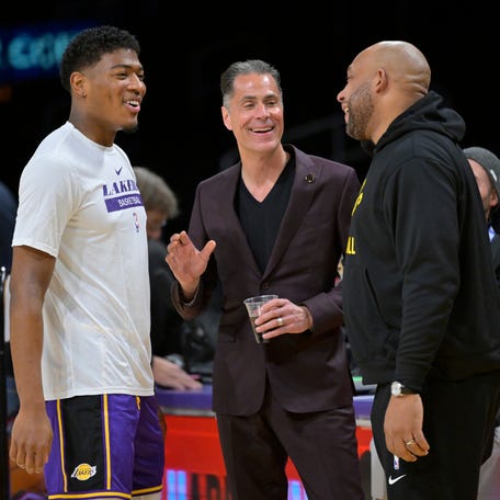 Will Rui Hachimura return to the Lakers? He is now a restricted free agent after the Lakers extended him a qualifying offer. GM Rob Pelinka, middle, said he's interested in bringing the core that finished strong back.