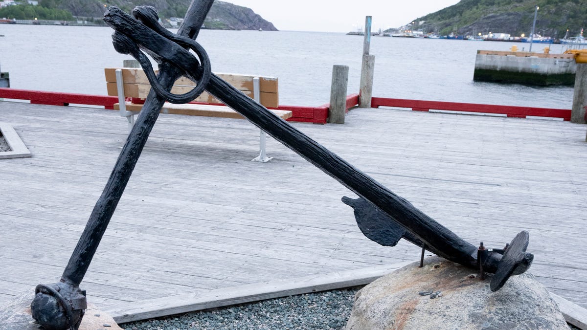 Five roses sit under a ceremonial anchor along the waterfront in St. John's, Newfoundland on Saturday June 24, 2023. Authorities from the U.S. and Canada began the process of investigating the cause of the fatal Titan submersible implosion even as they grappled with questions of who was responsible for determining how the tragedy unfolded.