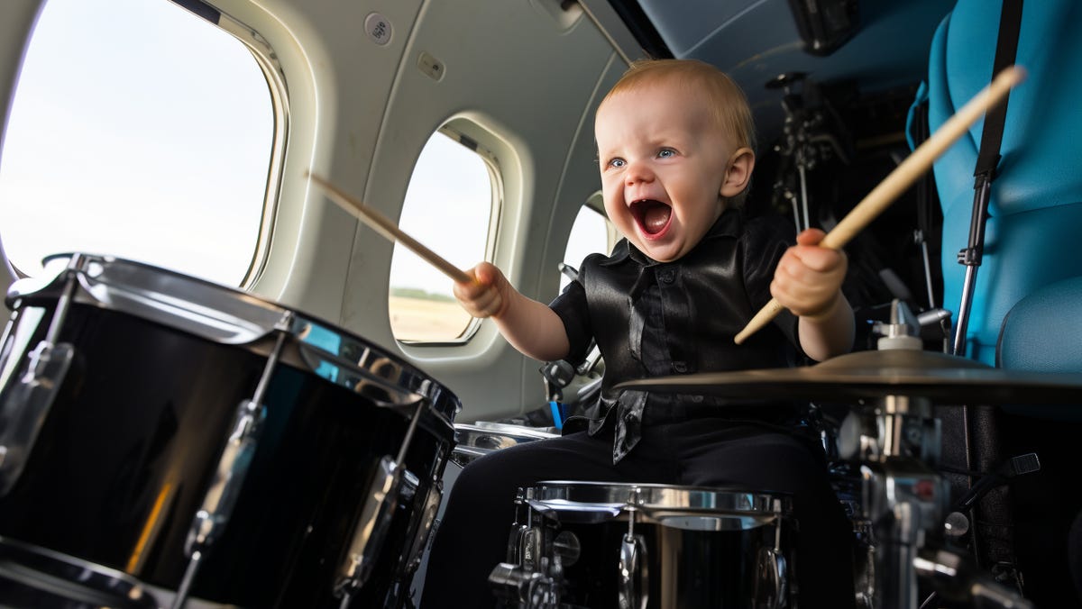 Baby playing drum solo.