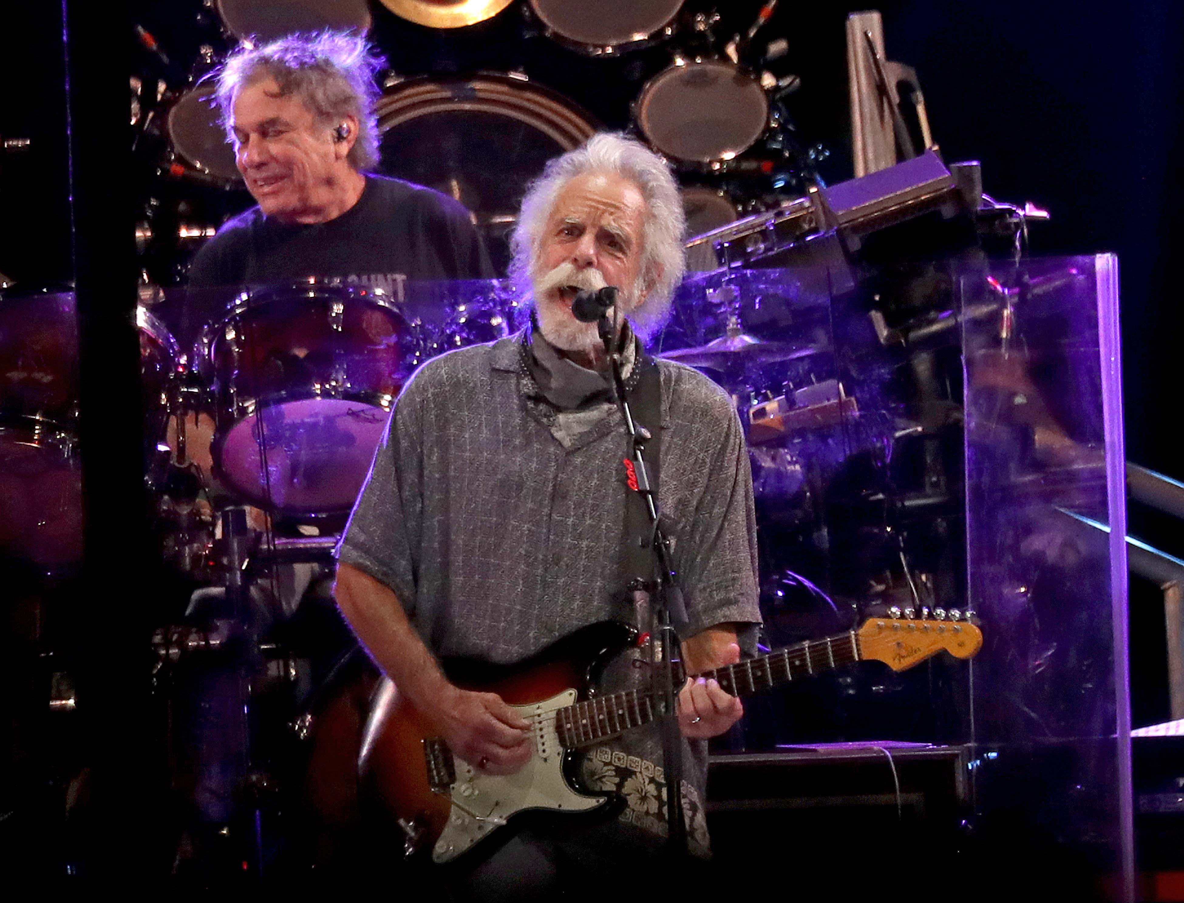 Bob Weir, at front, and Mickey Hart of Dead and Company performing at Wrigley Field in Chicago on Sept. 17, 2021.    Dead Company 01396