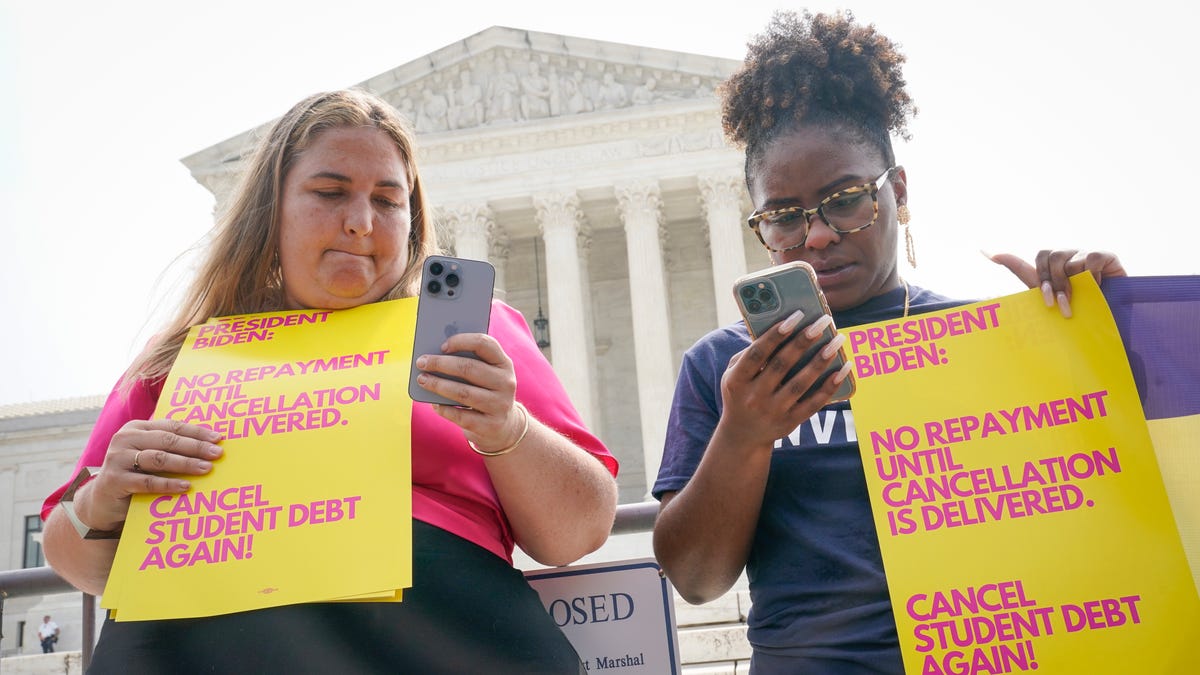 NextGen America student debt relief advocates listen and react as The United States Supreme Court released opinions on Department of Education v. Brown and Biden v. Nebraska, on Friday, June 30, 2023, the last day of the 2022-23 term.