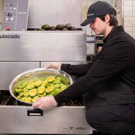 Autocado is a collaborative robot prototype that cuts, cores, and peels avocados before they are hand mashed to create Chipotle's guacamole.