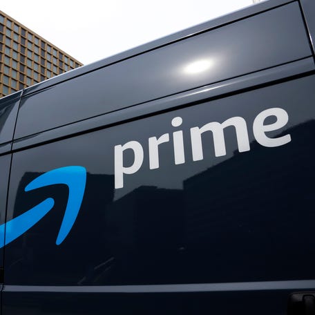 FILE - An Amazon Prime delivery vehicle is seen in downtown Pittsburgh on March 18, 2020. Amazon said Thursday, July 13, 2023 it had its biggest Prime day event ever this year. The e-commerce company did not reveal how much money it earned during the two-day sales event, which took place on Tuesday and Wednesday. But the company touted 375 million items that it says were purchased worldwide by Prime members, who pay $14.99 per month or $139 per year for   different perks including faster shipping. (AP Photo/Gene J. Puskar, File)