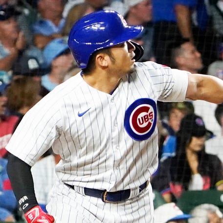 The Chicago Cubs' Seiya Suzuki hits a home run during his team's 17-3 win against the Washington Nationals at Wrigley Field.