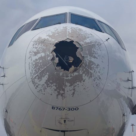 The nose of the plane sustained damage from the giant hail.