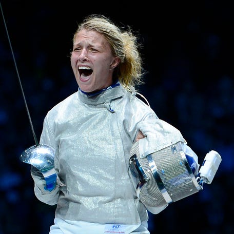 Olga Kharlan reacts after winning the bronze medal of the women's sabre competition during the London 2012 Olympic Games.