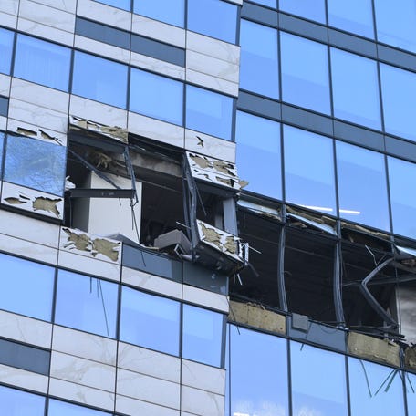 A view of the damaged skyscraper is shown in the Moscow City business district after a reported drone attack early Sunday, July 30, 2023.